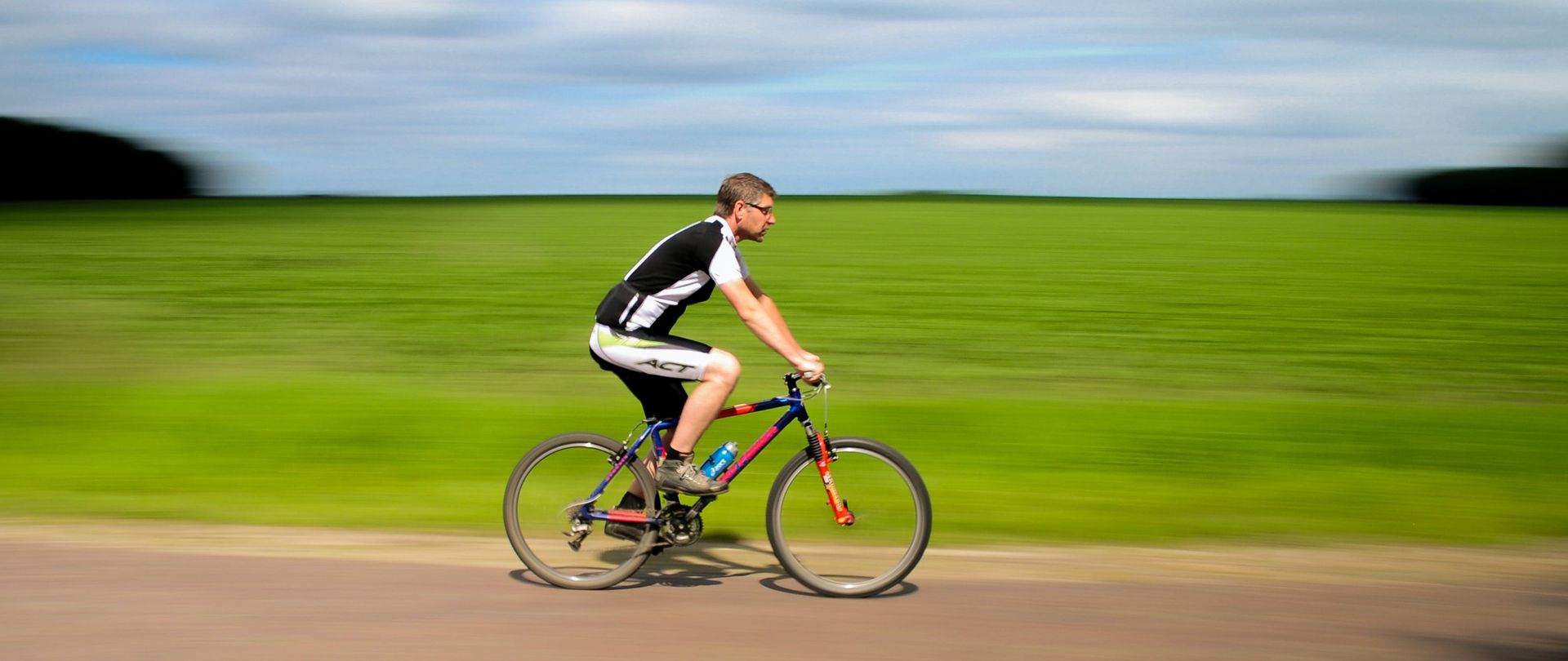 man cycling near field