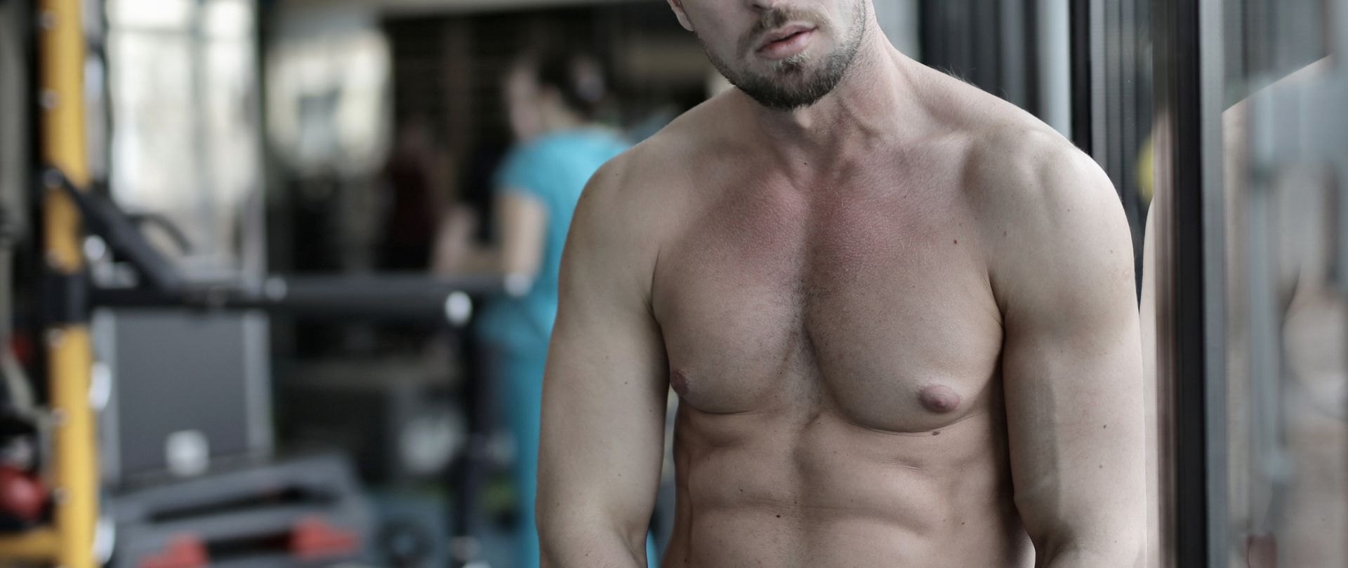 shirtless man at gym