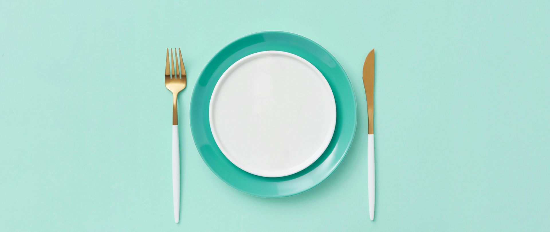 empty plate with knife and fork 