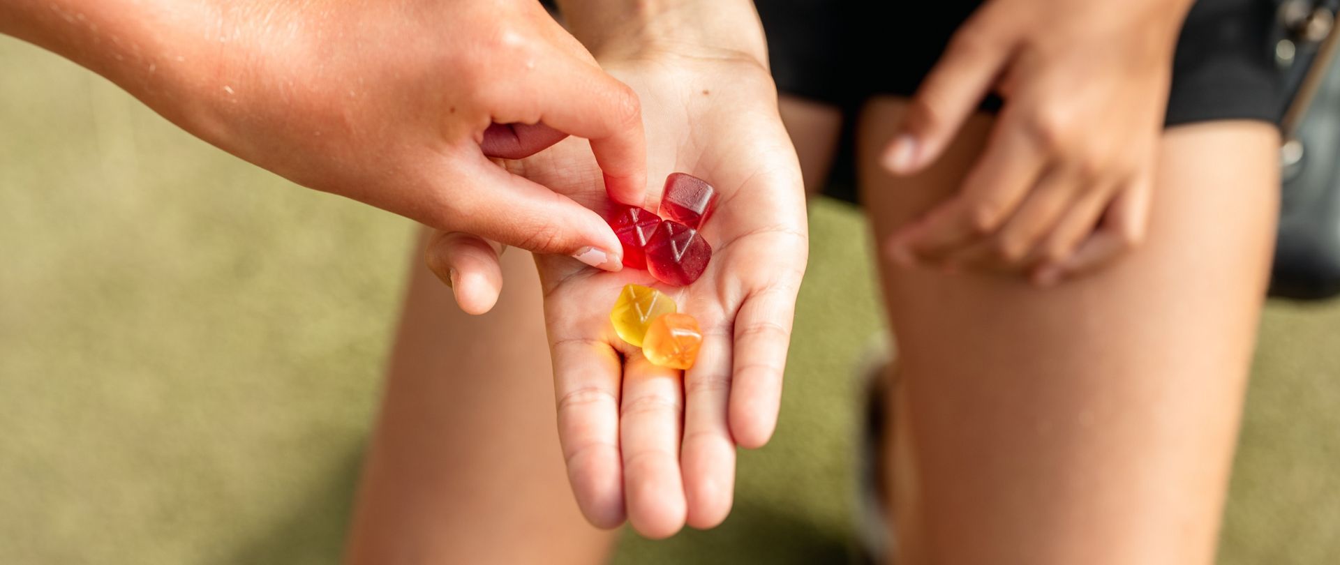 person holding gummies